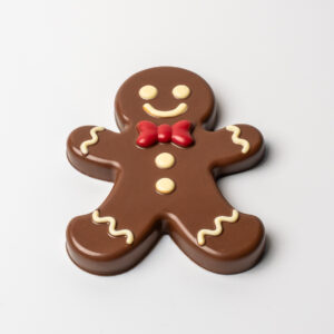 Zenzì , barretta di cioccolato al latte ripiena di pan di zenzero, cremino al caramello e biscotti